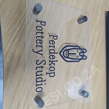 Perdekop Pottery Studio clear acrylic sign